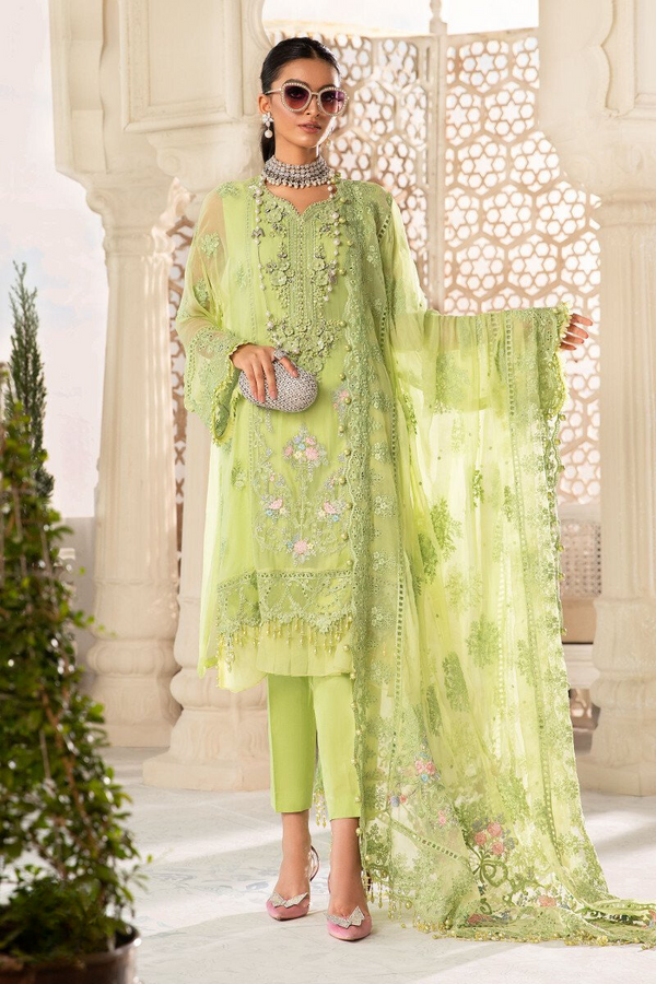 Luxurious Pistachio Green Georgette Pakistani Suit: Rich Embroidery Workmanship